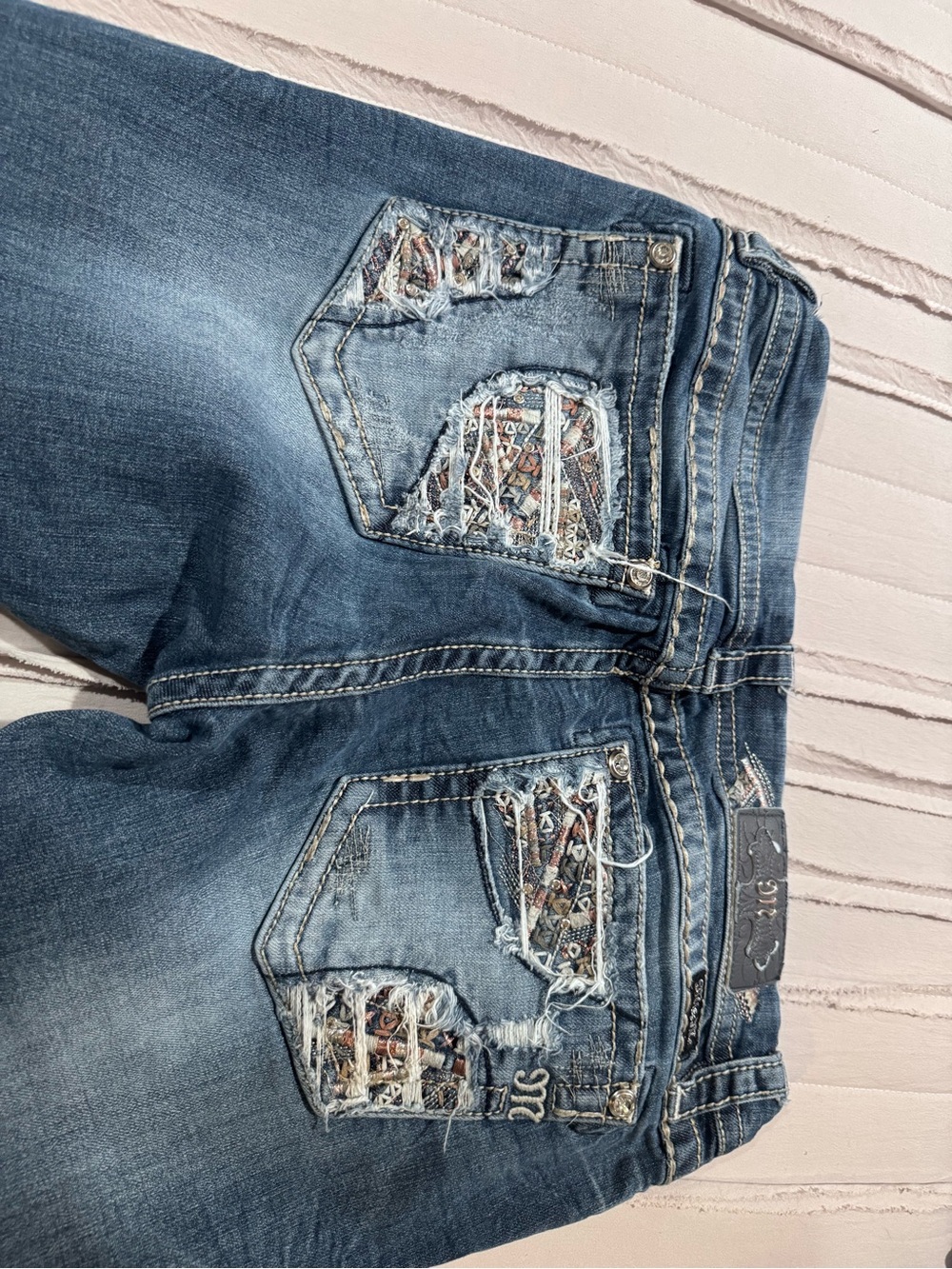 Miss Me Blue Distressed Boot Cut Jeans with Embroidered Patchwork